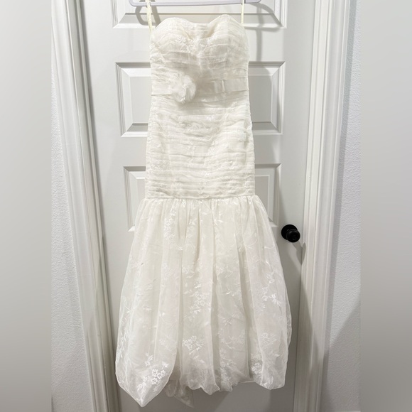 Elegant Strapless Ivory Wedding Dress - Picture 2 of 15